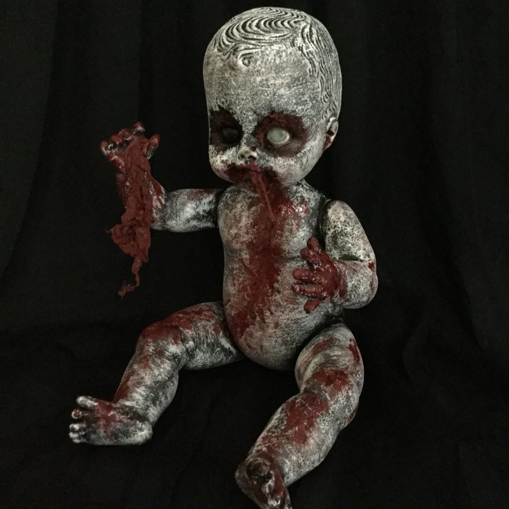 I love to repurpose old, unloved dolls into creepy, horrific works of art!