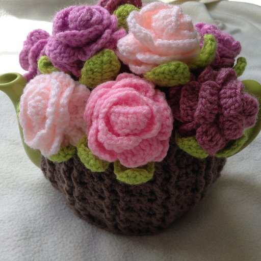 crochet tea cosy, baby booties, appliques, bottle covers, scarves and lot of more.