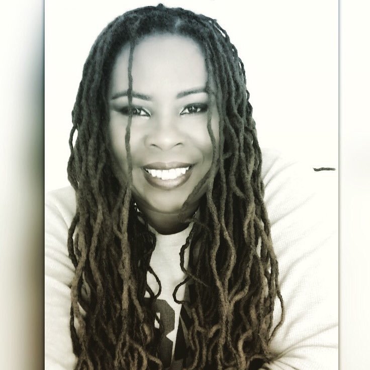 A mother, wife and geek to the heart with long locs