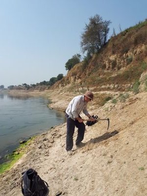 Geologist with British Geological Survey recording a few photos from working life