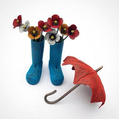 Bumberboots's profile picture. Hancrafted mini rainboots & umbrellas - only available at Pike Place Market.