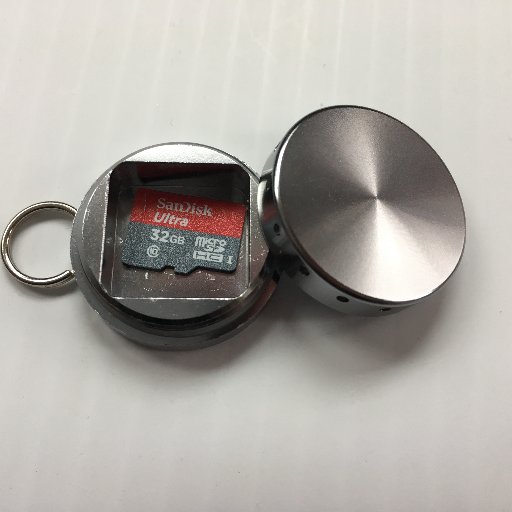 Canister Project is a purpose built container for microSD cards and SIM. Aluminum with a screw top.