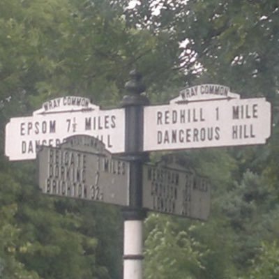 Here I sit, half way between Redhill and Reigate, over-looking a beautiful leafy area and pointing you all in the right direction.