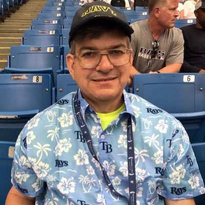 Tampa Bay Rays, Math, Iowa Hawkeyes, Lutherans, Barbershop and Choral Music, Navy Vet, now collecting baseball parks and new countries.