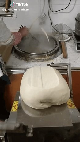Dao xiao mian (knife shaved noodles) machine.