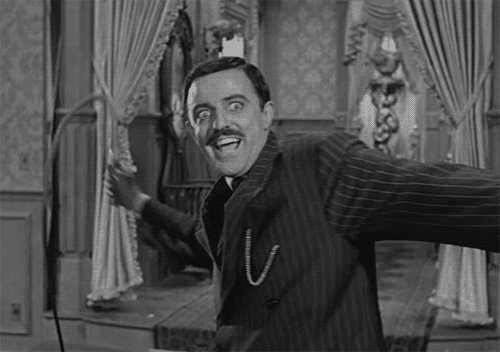 John Astin knows how to give Carolyn Jones a Happy Birthday smooch. 