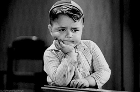 Annoyed boy from Little Rascals impatiently drumming fingers