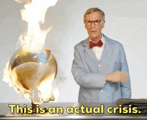 A gif of Bill Nye the Science guy standing in front of a glo