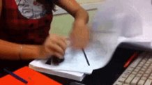 gif of someone stamping a large number of paper documents ve