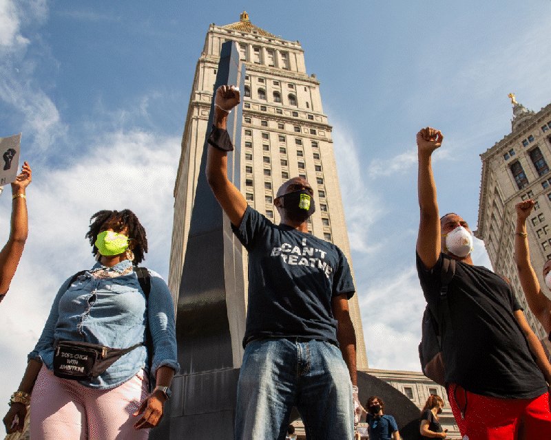 Gif featuring a crowd of protesters at Foley Square in Manha