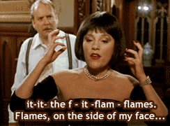 Gif of Miss Scarlet from the movie Clue saying “flames on 