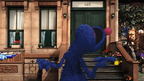 Gif of Grover from Sesame S...