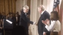 Handshake Trump GIF