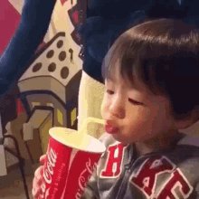 Kid Drinks GIF