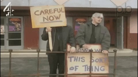 Gif with Father Ted and signs saying "down with this so