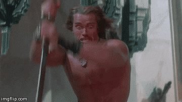 Gif of Arnold Schwarzenegger as Conan the Barbaian, aggressi