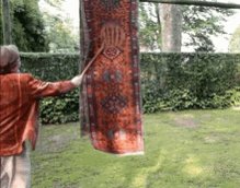 Rugs Beating GIF