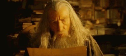 Gandalf lendo um texto