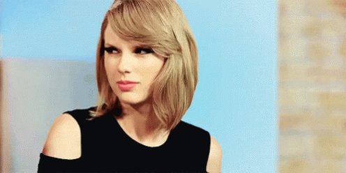 taylor swift sneering and rolling her eyes