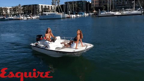 Girls Waving On A Boat GIF