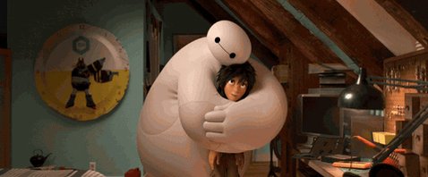 Baymax and Hiro from Big Hero 6. Baymax has his arms wrapped