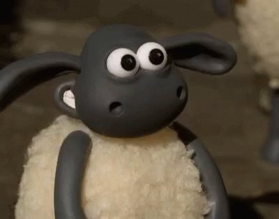 Claymation Shaun the sheep grinning and giving two thumbs up