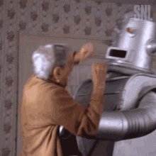 Robot Attack Saturday Night Live GIF