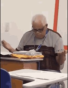 Finals Week Checking Papers GIF