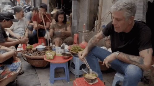   Bourdain happy birthday Plastic red chairs as favorite on the street. 
