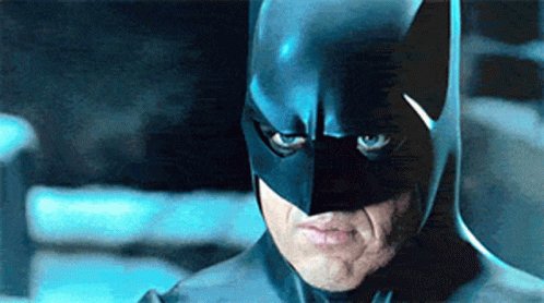 Michael Keaton as Batman gr...