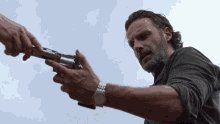 Daryl Dixon Gives Rick Grim...