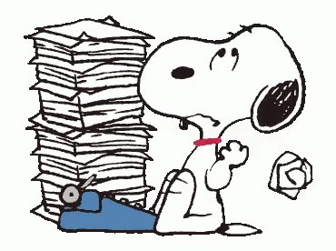 het witte hondje Snoopy zit...