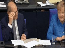 Olaf Scholz neben Angela Merkel auf der Regierungsbank. Scho