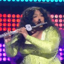 Play Flute Lizzo GIF