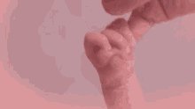 Baby Hand Holding Mother GIF