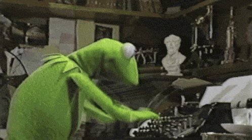 kermit at a typewriter