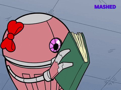 Pink robot reading a book