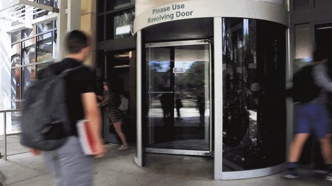 revolving door library GIF ...