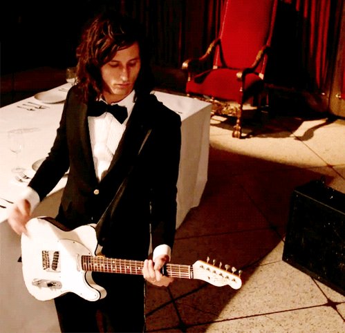 Happy birthday Nick valensi u look so good in a suit 