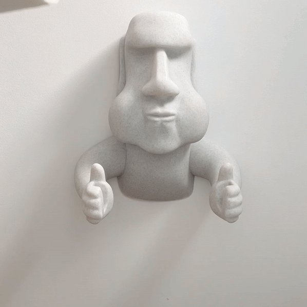 cults-on-twitter-hilarious-toilet-roll-holder-of-a-moai-sculpture