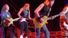 Happy birthday, Adrian Smith.

And Bruce is ready to light your candles on the cake.  