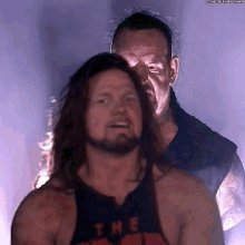 The Undertaker Aj Styles GIF