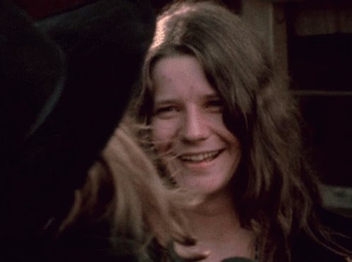 Janis Joplin riendo en un g...