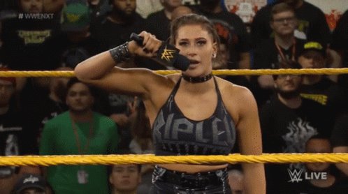 Rhea Ripley Mic Drop GIF