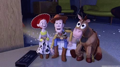 An animated still from Toy Story 2, where Jessie, Woody and 