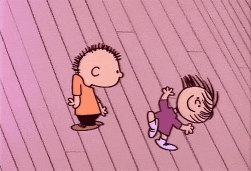 Two Peanuts characters danc...