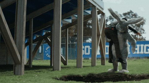 암호화폐 추측의 토끼 굴을 나타내는 토끼 마스코트가 구멍을 파는 GIF